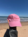 Casquette rose et rouge